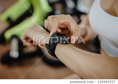 closeup sport people wearing wrist smart watch health data tracker or exercise HR measure device 126945557