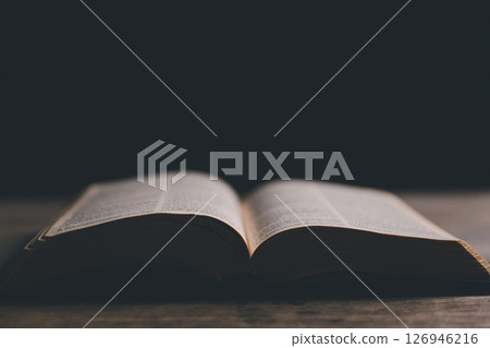Religious belief concept Close up prayer Christian church service Bible Holy cross Spiritual power Blurred background Desk copy space Heaven God Catholic faith Praise book Jesus worship Gospel symbols Religious belief concept Close up prayer Christian church service Bible Holy cross Spiritual power Blurred background Desk copy space Heaven God Catholic faith Praise book Jesus worship Gospel symbols 126946216