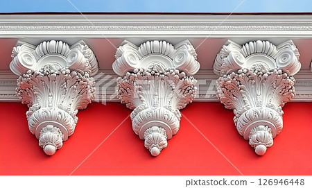 Ornate architectural detail, sculpted floral accents on a vibrant facade 126946448