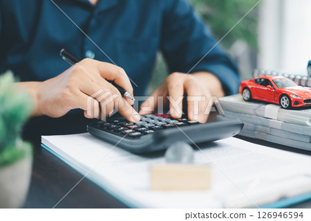 Businesswoman hand stamp approve on financial business approval document paper. Man hand accept permit contract agreement. Broker manager sign contract bank guarantee approved stamp application form 126946594