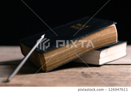 Religious belief concept Close up prayer Christian church service Bible Holy cross Spiritual power Blurred background Desk copy space Heaven God Catholic faith Praise book Jesus worship Gospel symbols Religious belief concept Close up prayer Christian church service Bible Holy cross Spiritual power Blurred background Desk copy space Heaven God Catholic faith Praise book Jesus worship Gospel symbols 126947611