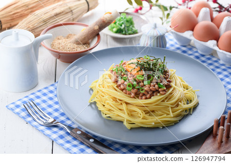 Natto pasta Japanese style spaghetti with raw egg and green onion Natto pasta Japanese style spaghetti with raw egg and green onion 126947794