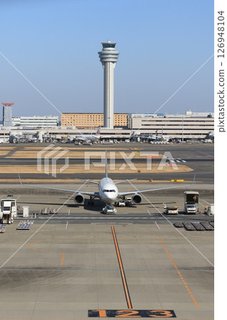Passenger plane preparing for departure Passenger plane moored offshore Passenger plane preparing for departure Passenger plane moored offshore 126948104