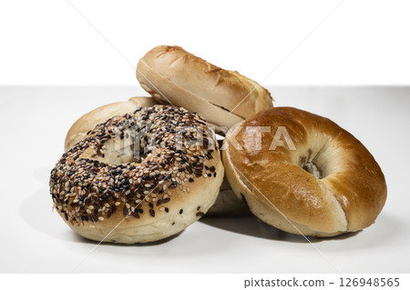 Closeup view of collection of bagel breads with various kind on a white background 126948565