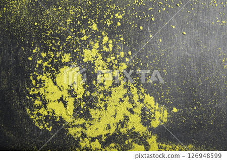 Closeup view of matcha green tea powder on the black table. Top view 126948599
