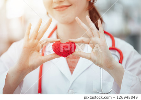 Doctor women hand holding red heart love sign for healthcare, Heart donation health checkup campaign 126948849