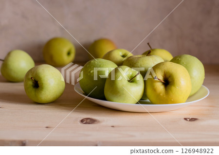 Apples of bright green color add freshness to the composition Apples of bright green color add freshness to the composition 126948922