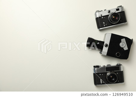 Retro cameras, shooting on retro cameras concept Retro cameras, shooting on retro cameras concept 126949510