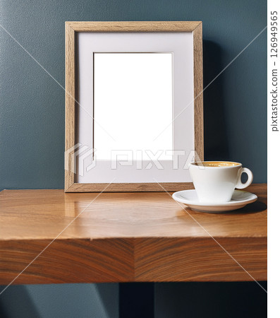 Stylish and modern interior design of kitchen space with a small wooden table with a photo frame layout. Generative AI. Accessories and a cup of coffee. Cozy decor of a room or cafe. 126949565