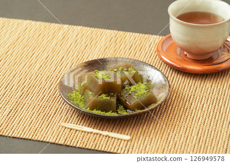 Matcha warabimochi and Japanese tea sweets Matcha warabimochi and Japanese tea sweets 126949578