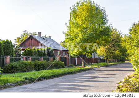 Brest Belarus colorful village streets with wooden huts brick houses . 126949815