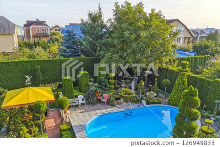 Beautiful pool in the garden in Brest Belarus. Beautiful pool in the garden in Brest Belarus. 126949833