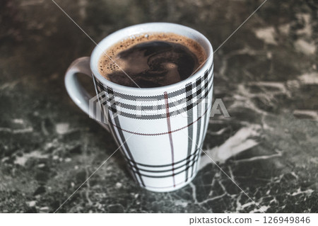 Coffee cup on marble table background in Brest Belarus. Coffee cup on marble table background in Brest Belarus. 126949846