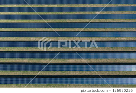 Photovoltaic panels farm in Germany, drone aerial view on a sunny day 126950236