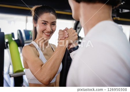 Sport woman healthy people exercising in sport club, Gym with strength body building keeping healthy. 126950308