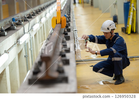 Train engineer working check inspecting railway track at Train station, advance engineering 126950328