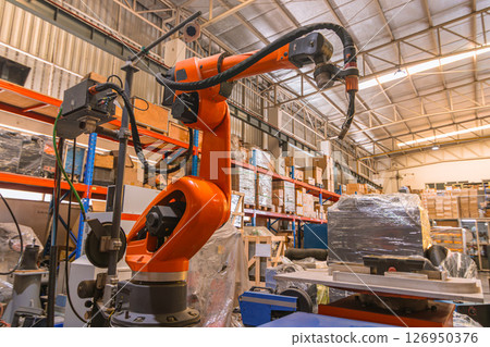 Robotic Smart Welding Machine. Welder arm machine, Robotic Welding or Robotic Arm Welding at Industrial Factory. Robotic Smart Welding Machine. Welder arm machine, Robotic Welding or Robotic Arm Welding at Industrial Factory. 126950376