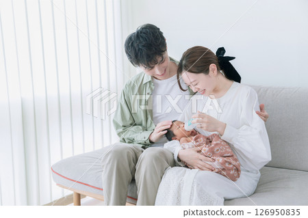 Newborn baby family gathering 126950835