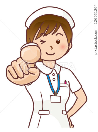 A female nurse pointing and winking 126951264