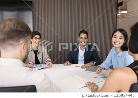 Happy diverse teammates take part in workshop or training session 126954445