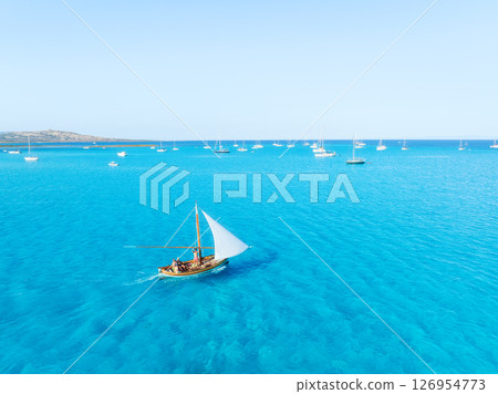 Summertime vacation. Sailing yacht at sea. Drone view on the yacht. 126954773