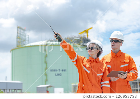 Petroleum workers, LNG tank inspection, Onshore Gas Site surveyor team, Oil Petrochemical industry 126955758