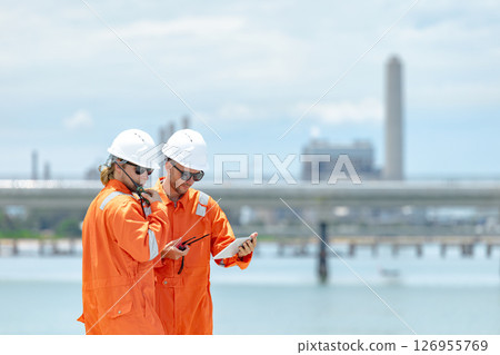Petroleum workers, shoreline inspection, Onshore Gas Site surveyor team, Oil Petrochemical industry Petroleum workers, shoreline inspection, Onshore Gas Site surveyor team, Oil Petrochemical industry 126955769