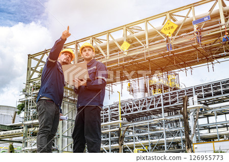 oil and gas refinery petroleum plant worker, working engineer check service maintenance gas transport pipe system outdoor oil and gas refinery petroleum plant worker, working engineer check service maintenance gas transport pipe system outdoor 126955773