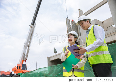 Construction engineer builder working team, Lead architect manager site inspection house construction project assessment process Construction engineer builder working team, Lead architect manager site inspection house construction project assessment process 126955793
