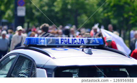 Warsaw, Poland. 25.05.2025. Police sign on police car. Polish police. 126956988