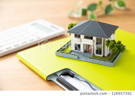 House and calculator 126957392