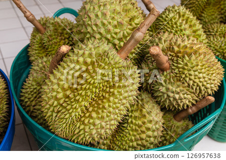 Pile of durian fruit at the seller stall 126957638