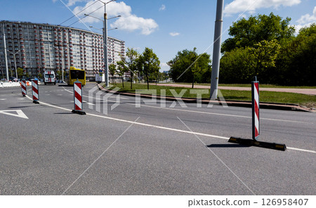 plastic barrier on a road plastic barrier on a road 126958407