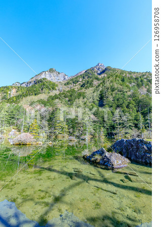 Early summer in Kamikochi, Myojin Ninoike Pond, Matsumoto City, Nagano Prefecture Early summer in Kamikochi, Myojin Ninoike Pond, Matsumoto City, Nagano Prefecture 126958708