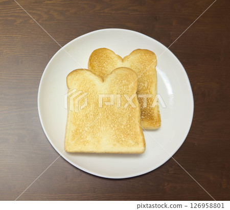 Simple toast on a white plate 126958801