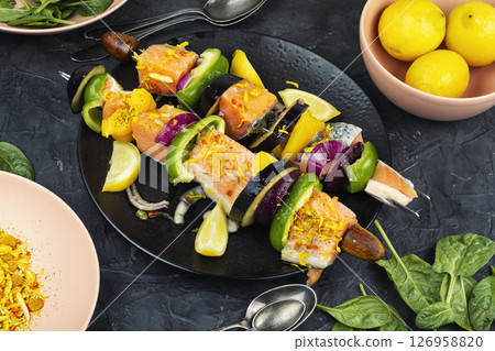Fresh salmon skewers with vegetables. 126958820