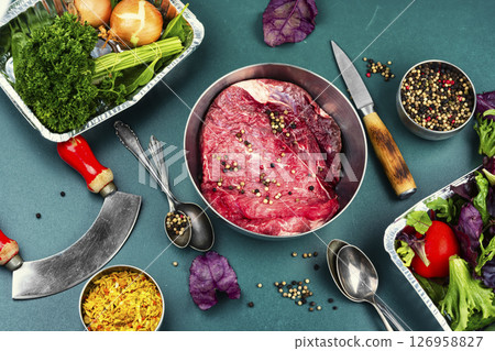 Seasoning Raw Beef Meat Fillet. 126958827