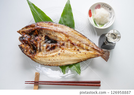 Grilled salted Atka mackerel with grated daikon radish Grilled salted Atka mackerel with grated daikon radish 126958887