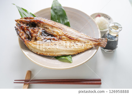Grilled salted Atka mackerel with grated daikon radish Grilled salted Atka mackerel with grated daikon radish 126958888
