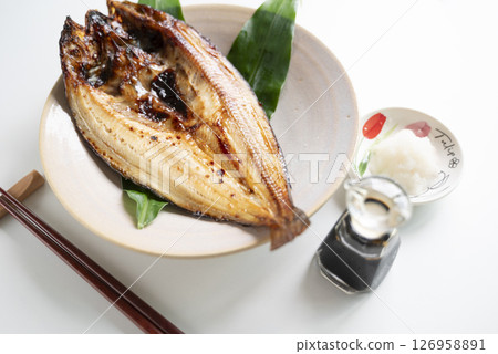 Grilled salted Atka mackerel with grated daikon radish 126958891