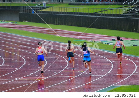 Track and field competition: long jump Track and field competition: long jump 126959021