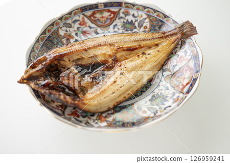 Salt-grilled Atka mackerel served on a decorative plate 126959241