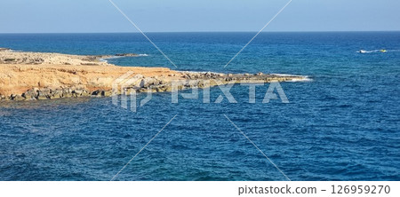 Island in Cyprus, the rocky beach of the bridge of lovers in Agia Napa. 126959270