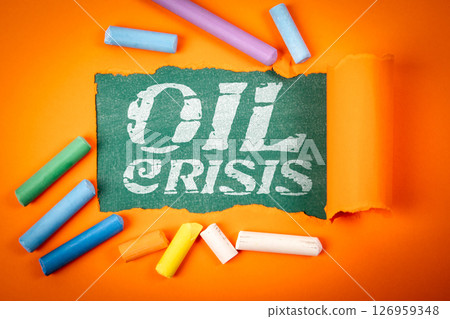 Oil Crisis Concept with Torn Paper and Colorful Chalk on Orange Background 126959348