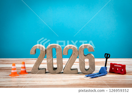 2026 Concept. Concrete Numbers on a Wooden Background 126959352
