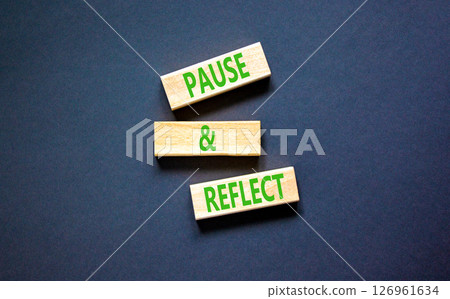 Pause and reflect symbol. Concept words Pause and reflect on beautiful block. Beautiful black table black background. Business motivational lifestyle pause and reflect concept. Copy space. 126961634