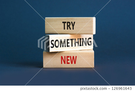 Try something new symbol. Concept words Try something new on beautiful block. Beautiful grey table grey background. Business motivational lifestyle try something new concept. Copy space. 126961643