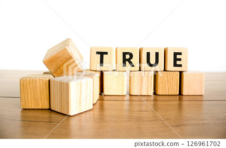 True symbol. Concept word True on beautiful wooden blocks. Beautiful wooden table white background. Business, lifestyle, support and true concept. Copy space. True symbol. Concept word True on beautiful wooden blocks. Beautiful wooden table white background. Business, lifestyle, support and true concept. Copy space. 126961702