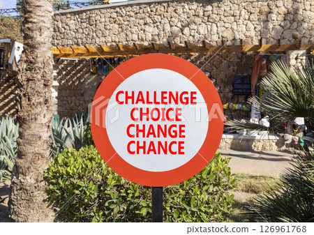 Challenge choice change chance symbol. Concept words Challenge choice change chance on beautiful road sign. Beautiful palm tree background. Business Challenge choice change chance concept. Copy space. Challenge choice change chance symbol. Concept words Challenge choice change chance on beautiful road sign. Beautiful palm tree background. Business Challenge choice change chance concept. Copy space. 126961768