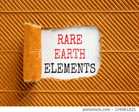 Rare earth elements symbol. Concept words Rare earth elements on beautiful white paper. Beautiful brown paper background. Business and rare earth elements concept. Copy space. 126961825